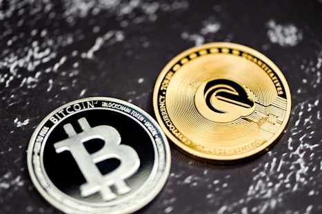 a bitcoin coin sitting on top of a table