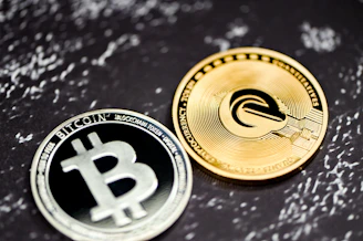 a bitcoin coin sitting on top of a table