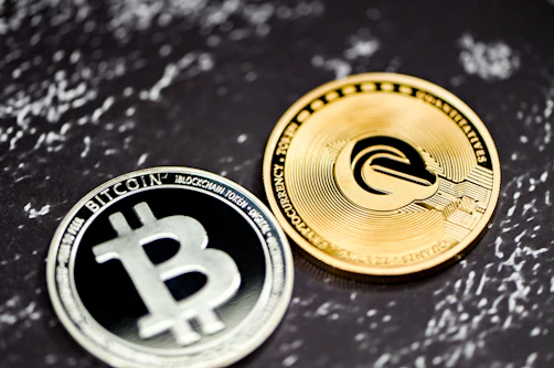 a bitcoin coin sitting on top of a table