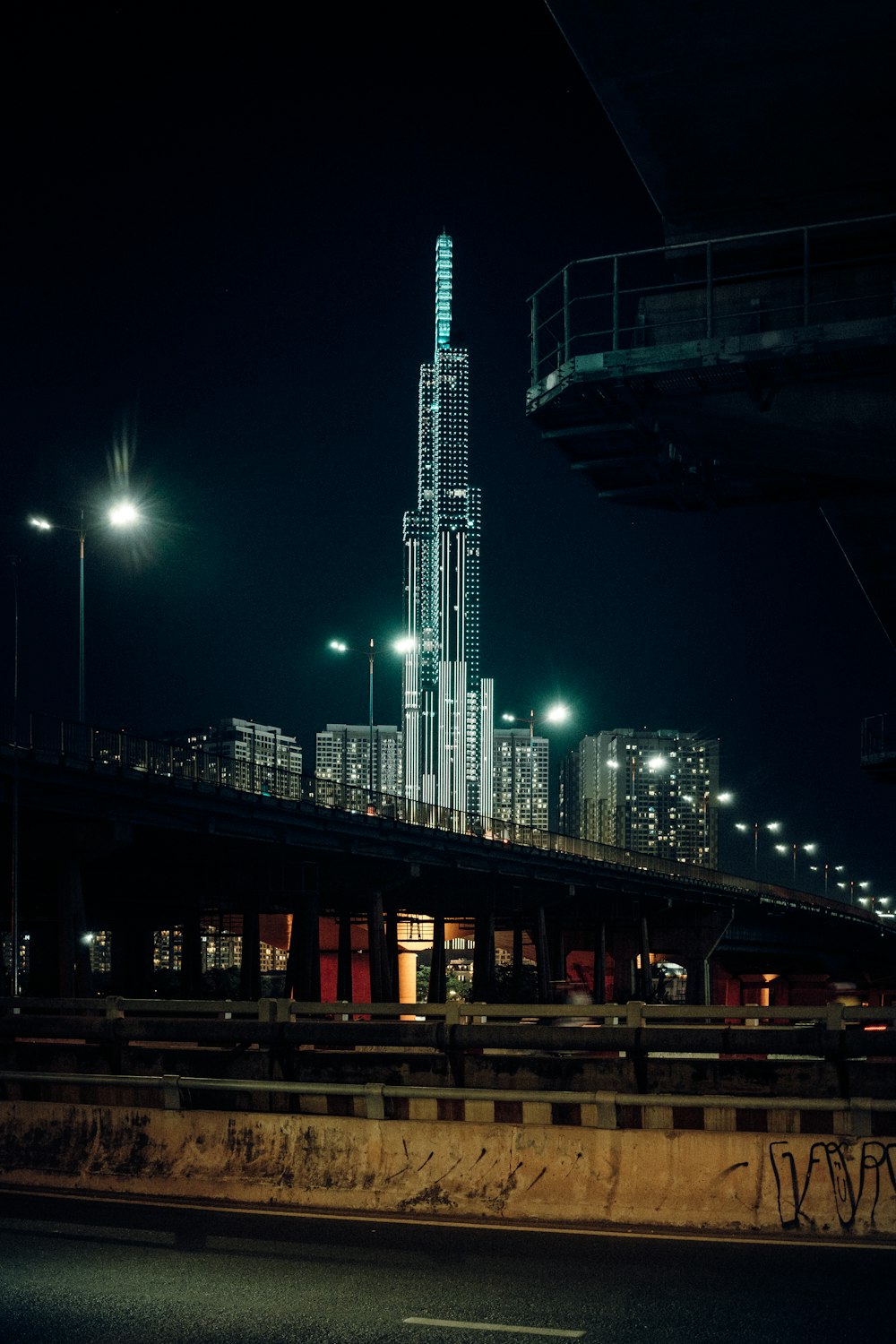 a very tall building sitting on the side of a road