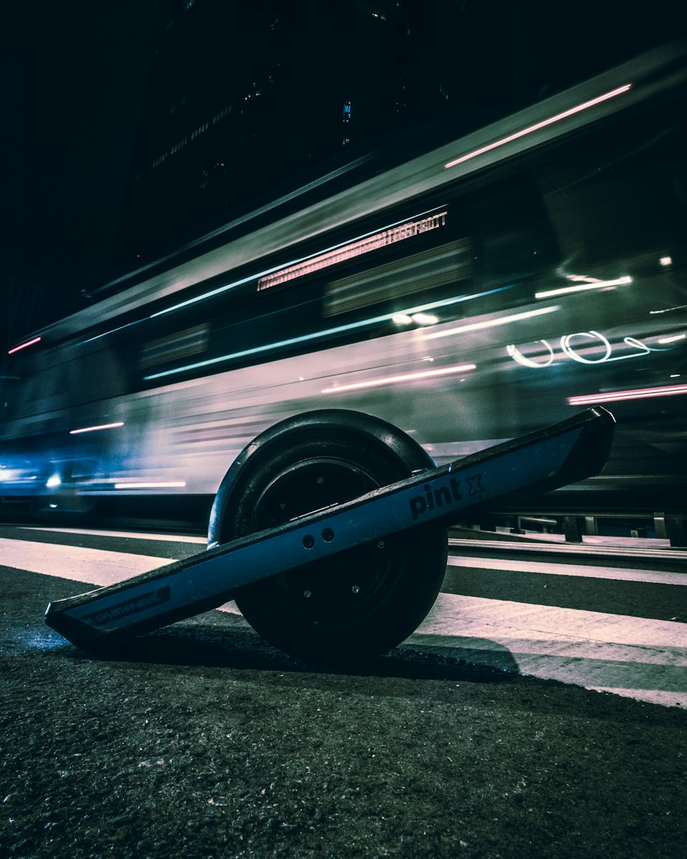 a car tire laying on the side of the road