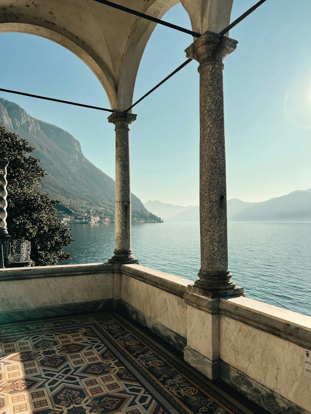 a view of a body of water from inside a building