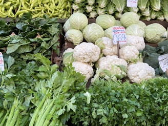 a bunch of vegetables that are on display