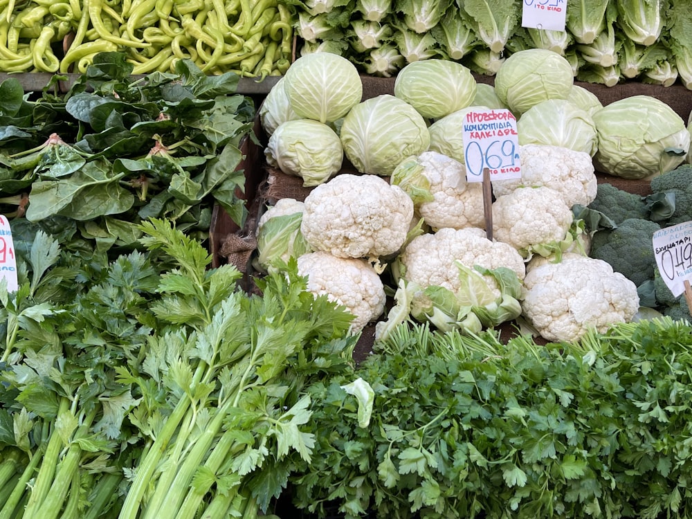 a bunch of vegetables that are on display