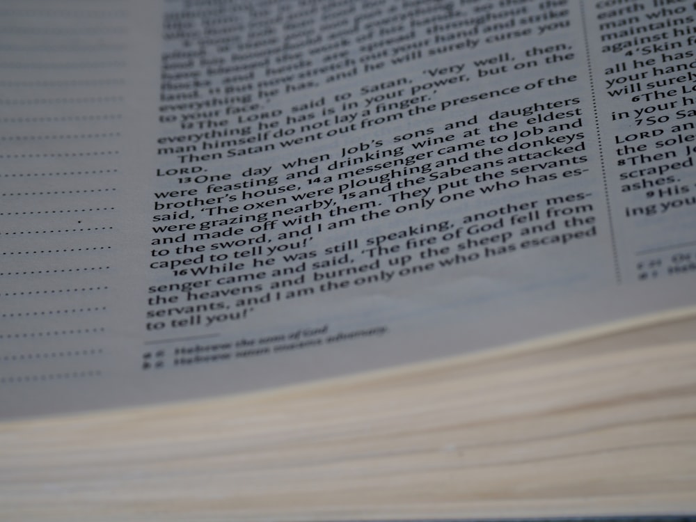 a close up of a book with an open page