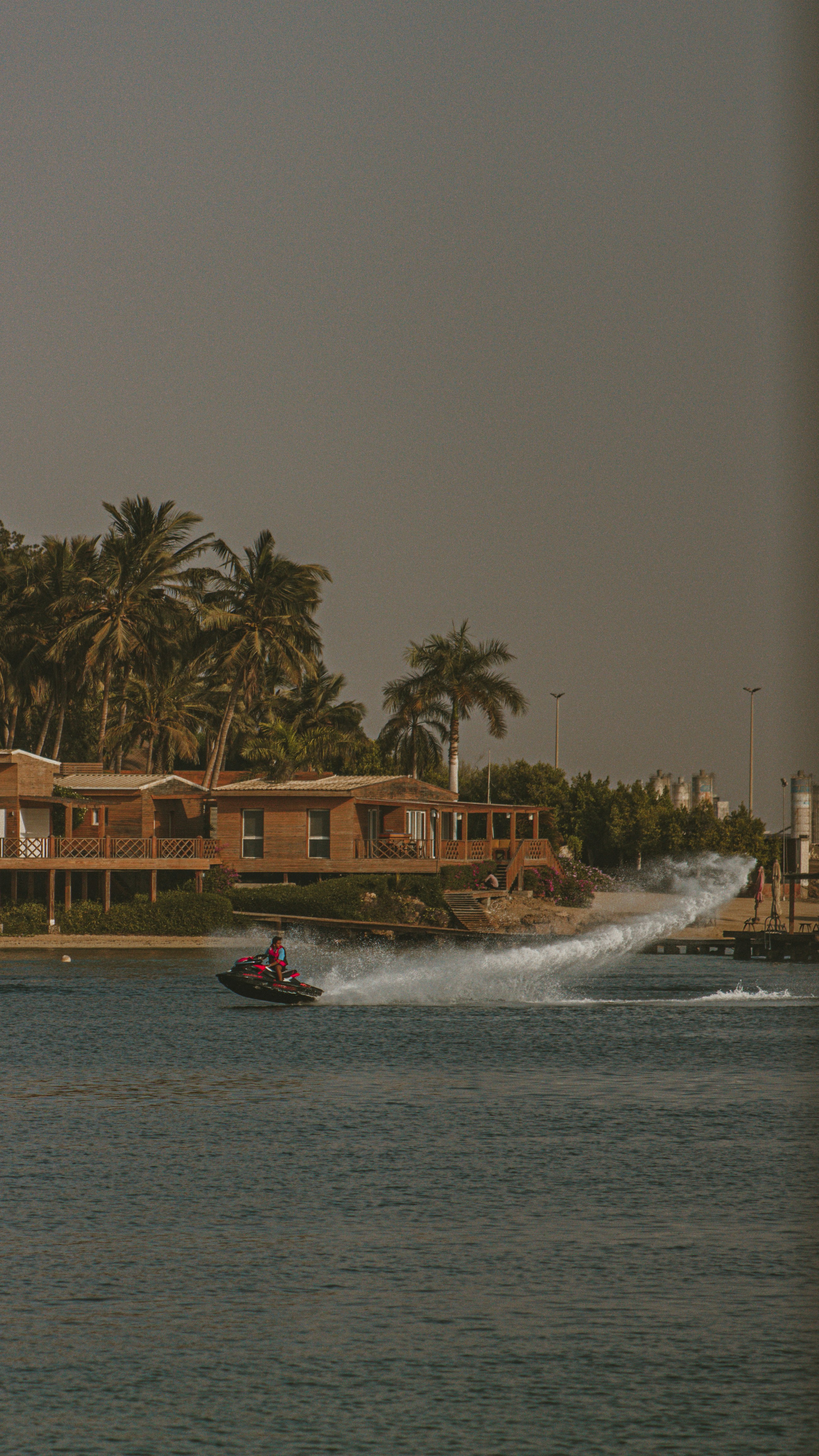 a boat traveling on a body of water