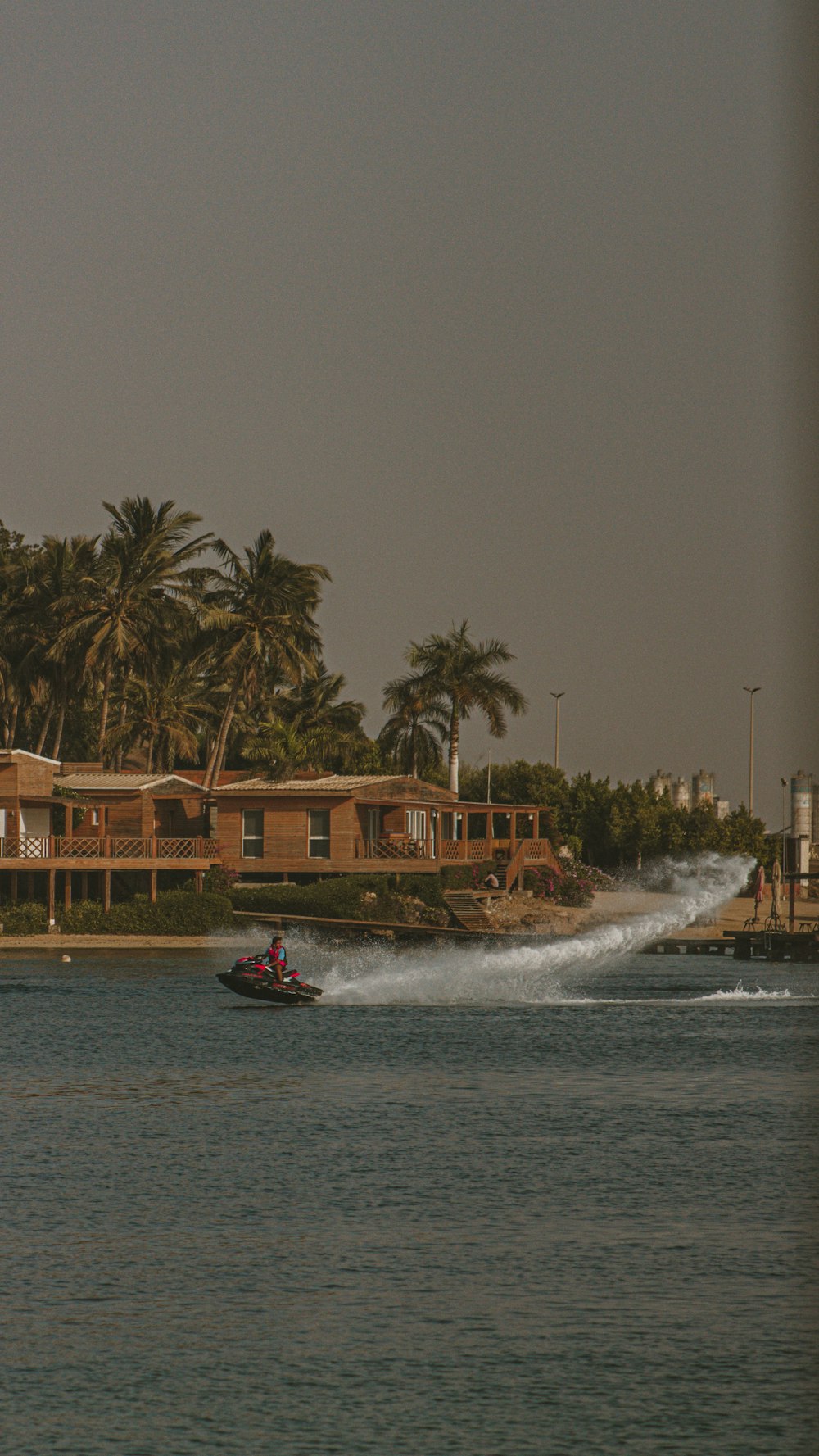 a boat traveling on a body of water