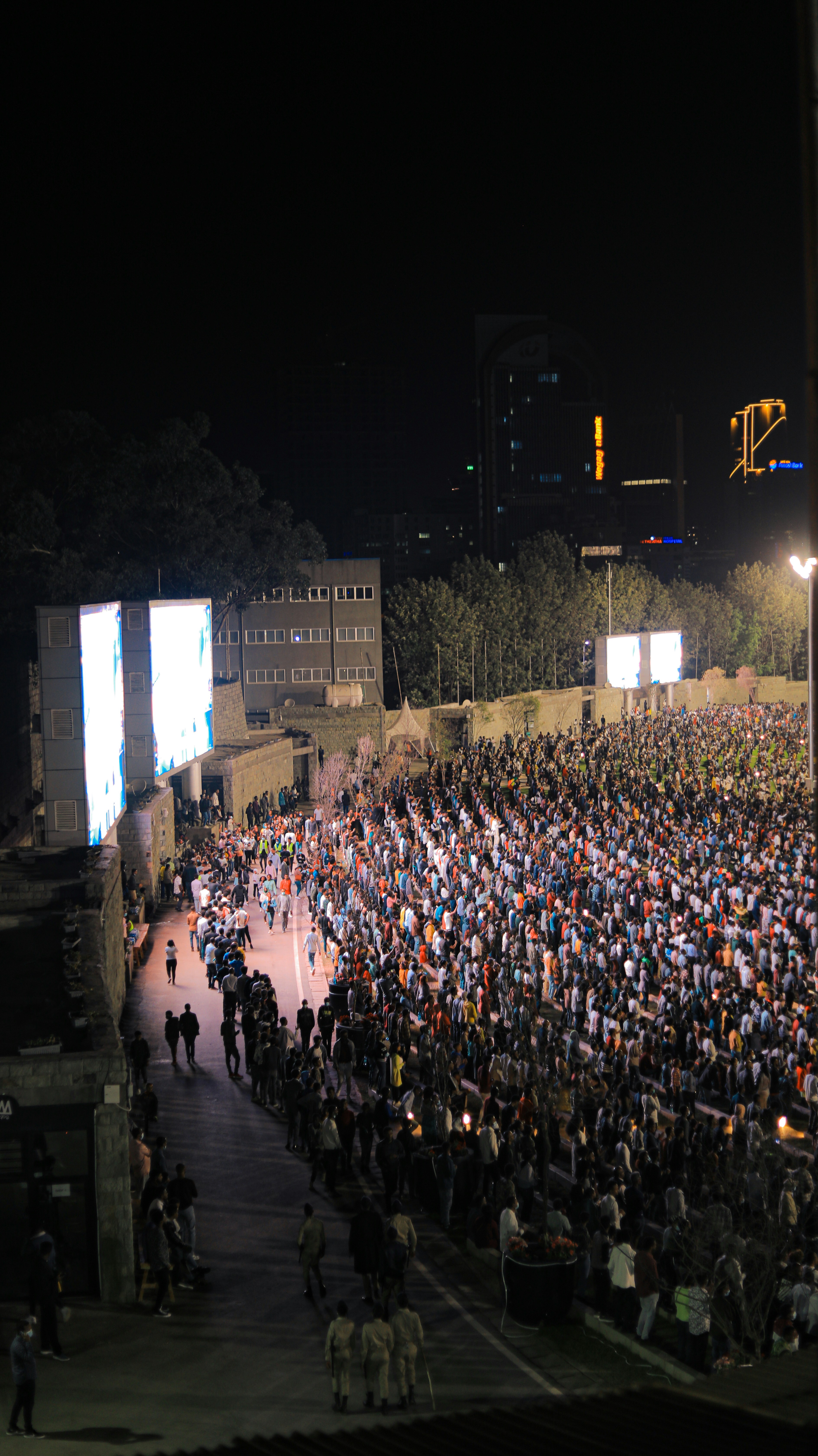 a group of people standing in front of a crowd
