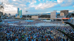 a group of people in a large city