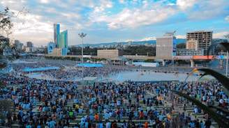 a group of people in a large city