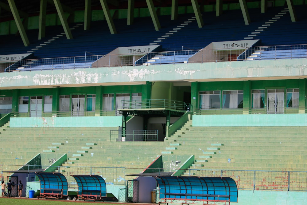 a stadium with a row of empty bleachers