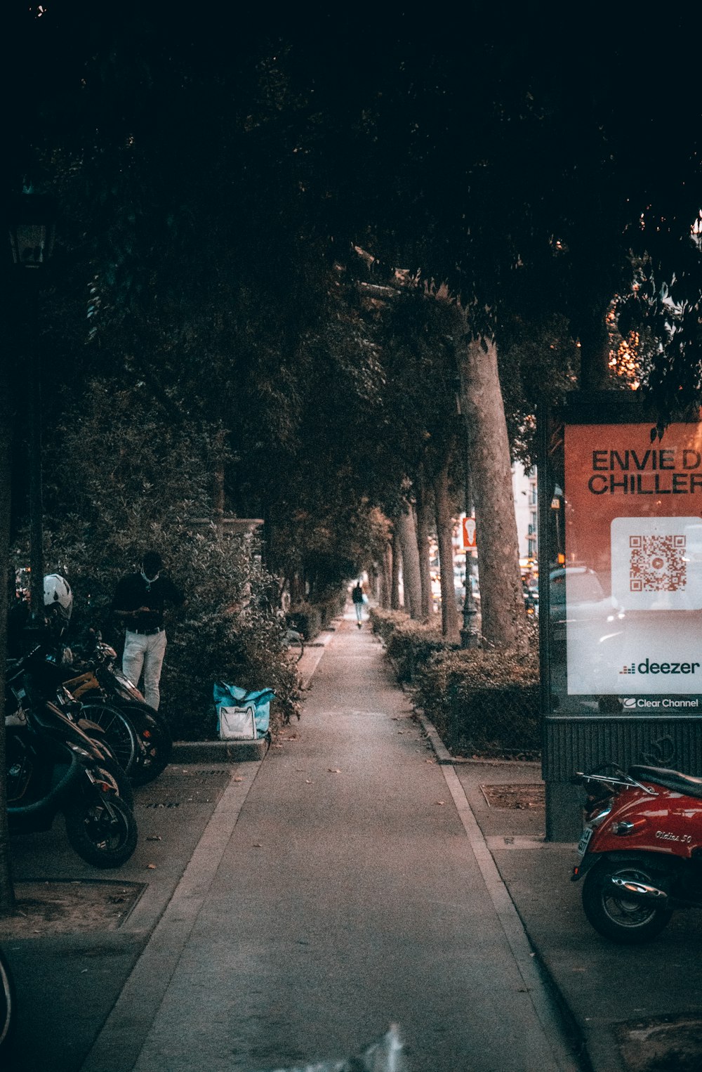 a motorcycle parked on the side of a road