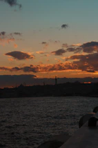 A scenic view of a popular dziriya landmark at sunset, glowing warmly.