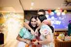 a couple of people that are hugging each other