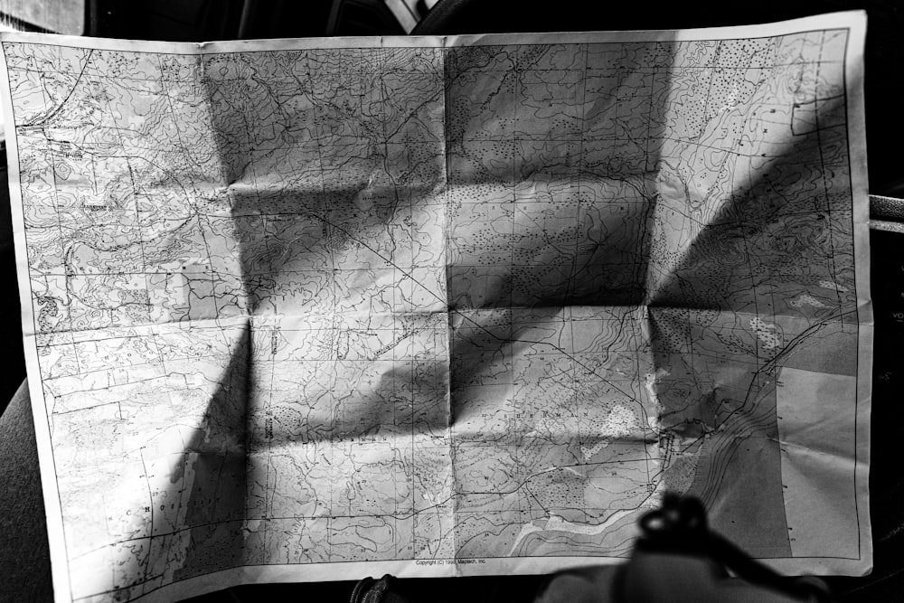 a black and white photo of a map