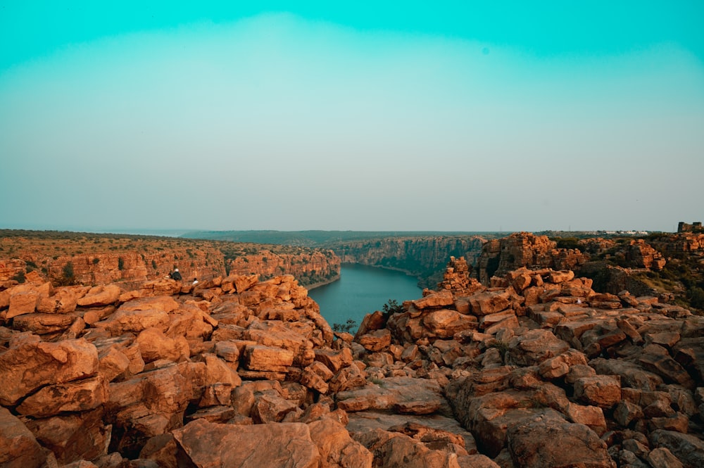 a large body of water surrounded by rocks