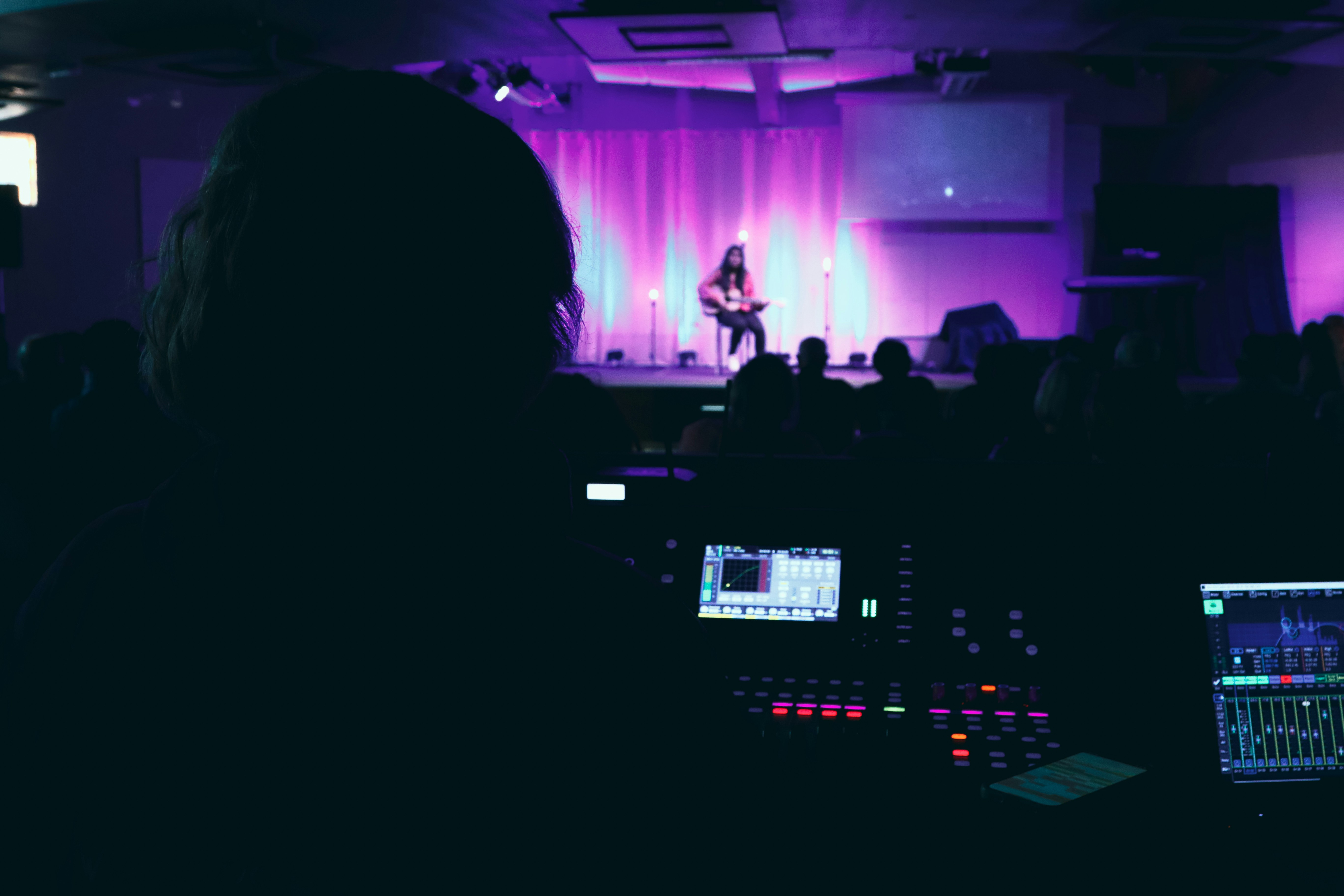 DJ performing with mixer