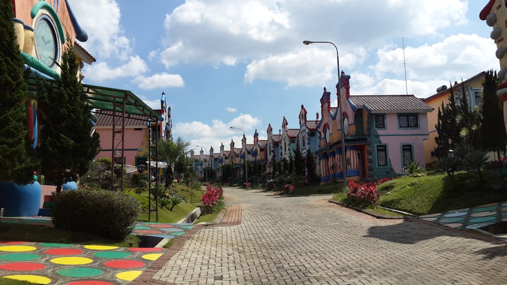 a row of colorful houses on a cobblestone street