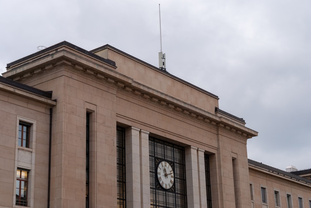 a large building with a clock on the front of it