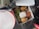 A plate of freshly prepared home-style cooked food served in takeaway containers.