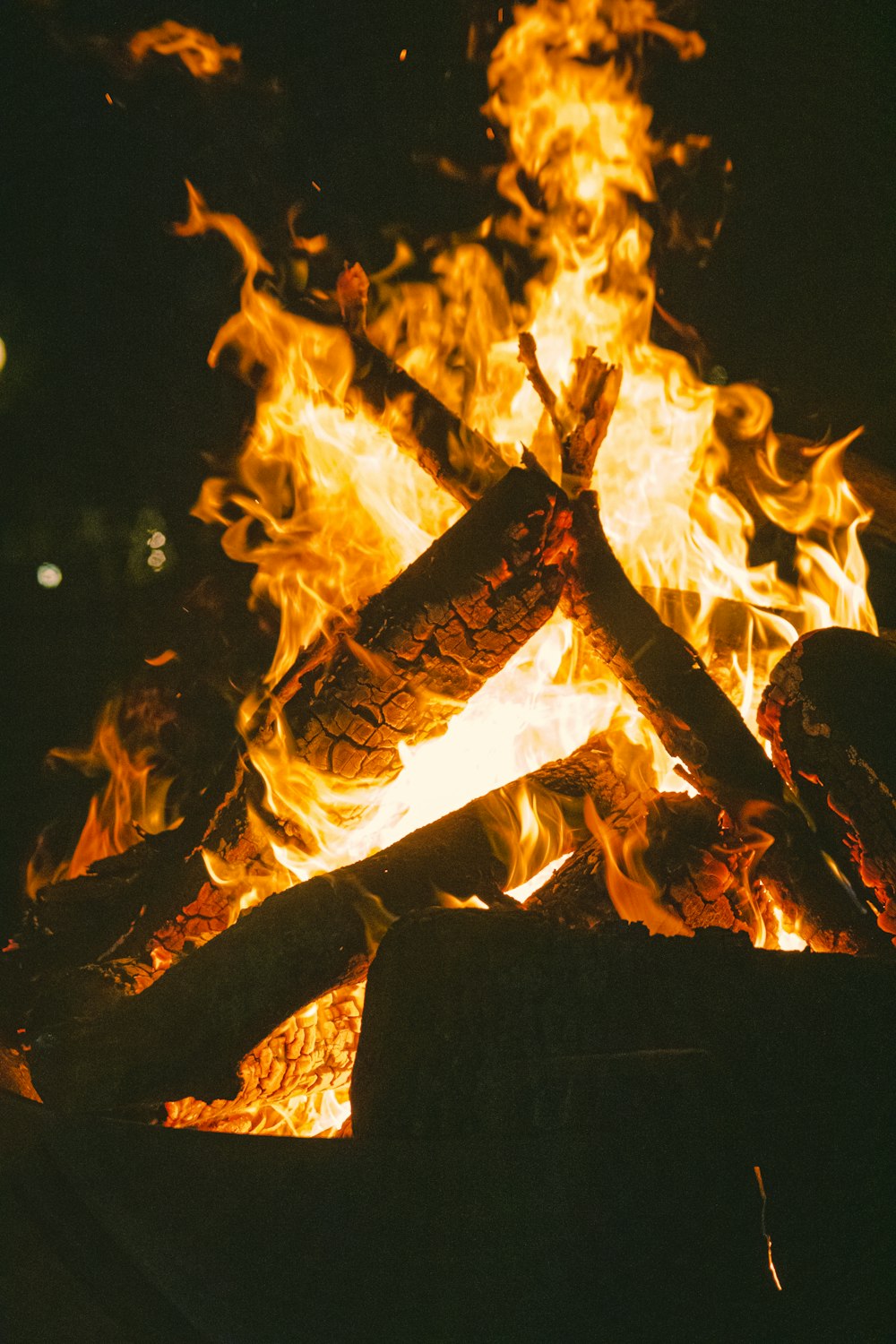 a close up of a fire in the dark