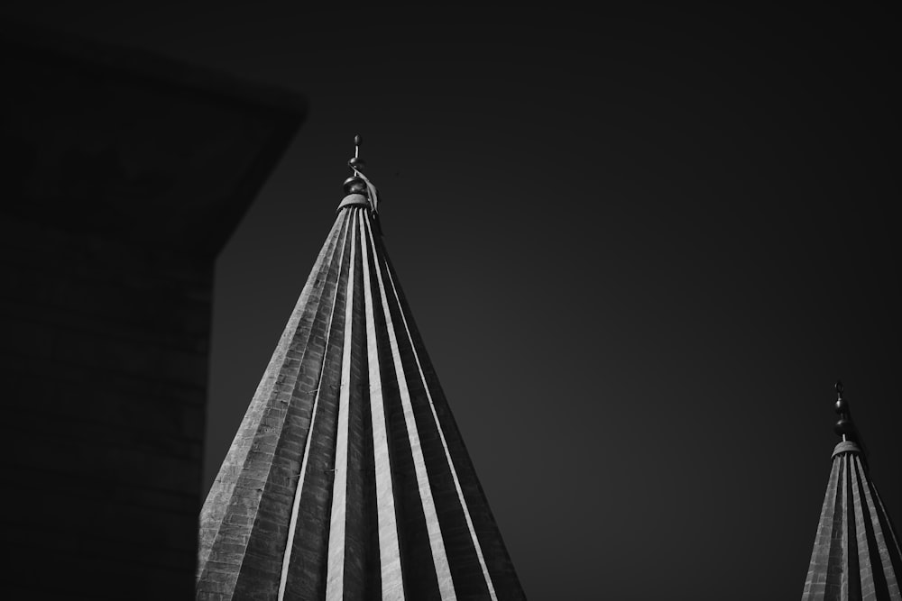 a black and white photo of a tall building