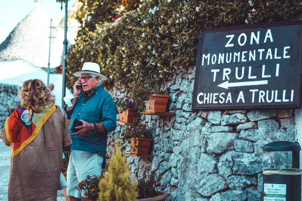 a group of people standing outside of a building