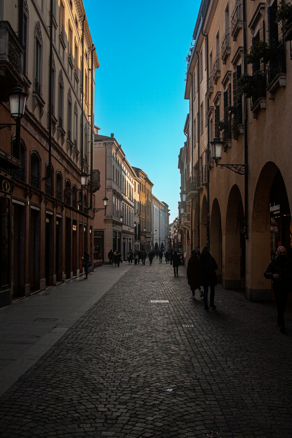 a cobblestone street in a european city