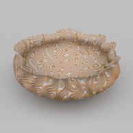 a brown and white bowl sitting on top of a table