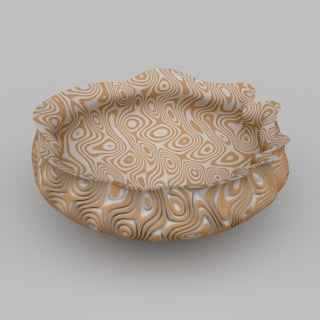 a brown and white bowl sitting on top of a table