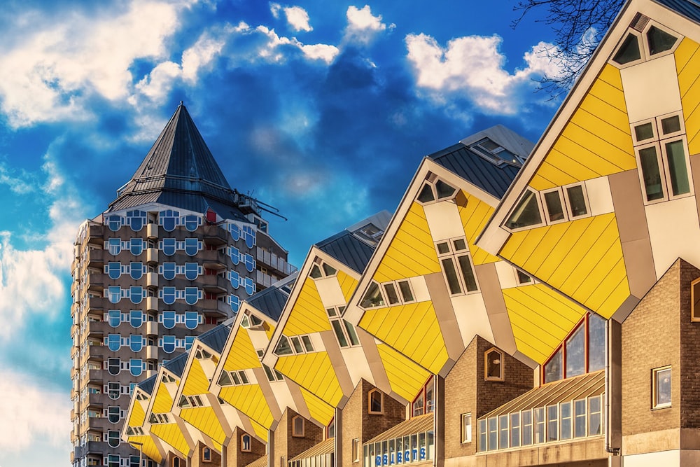 a row of houses with a sky background