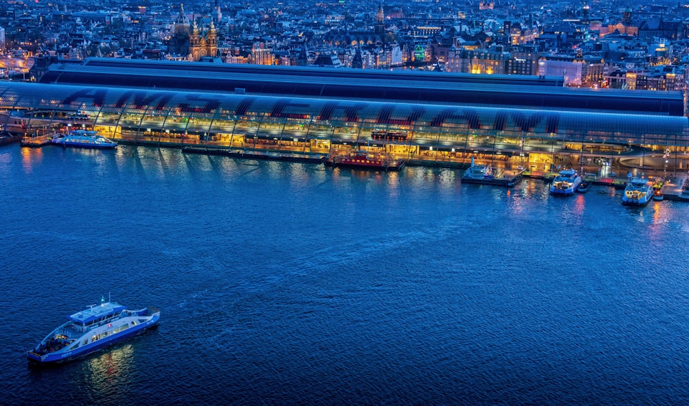 a large body of water near a city at night