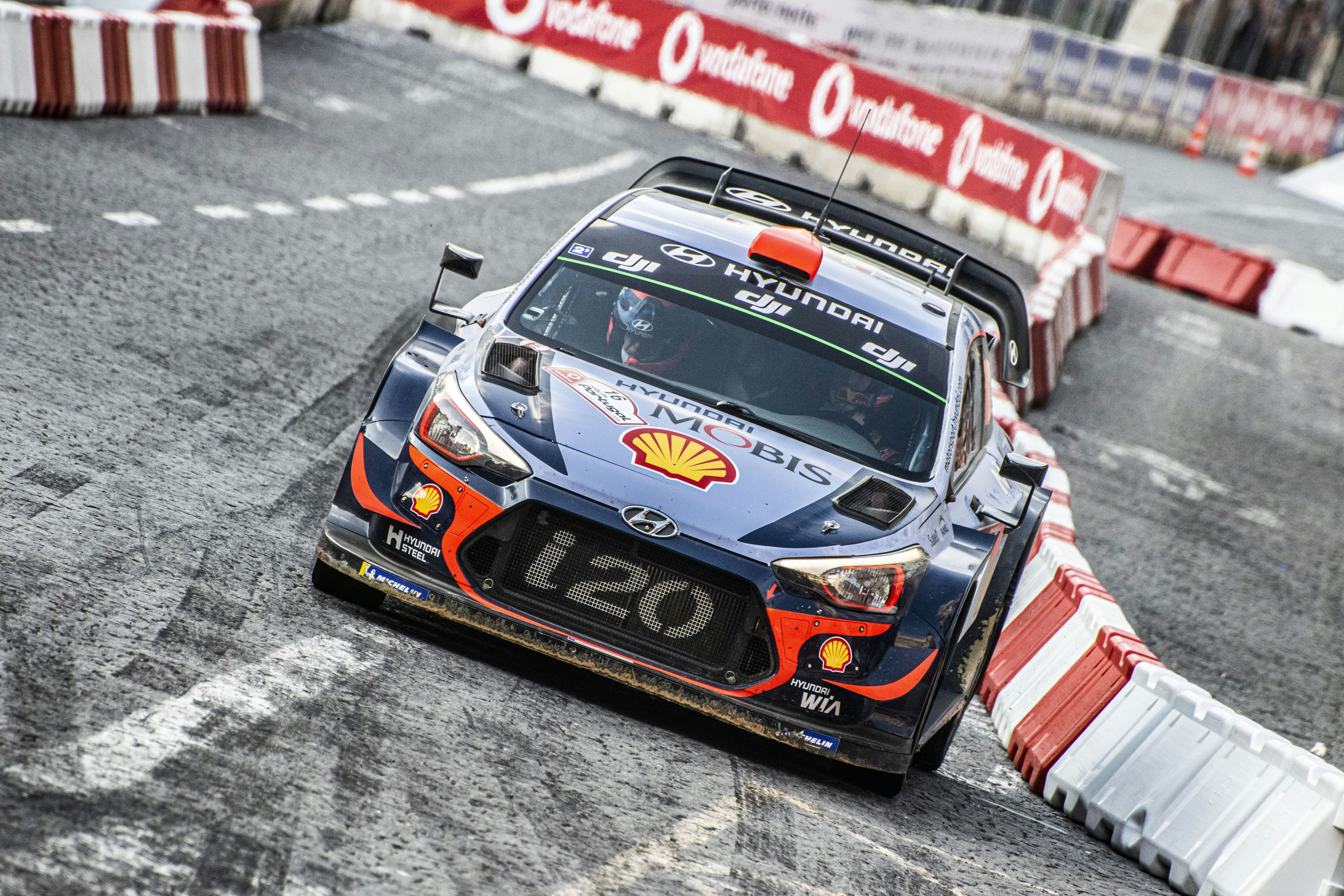 a race car driving down a race track