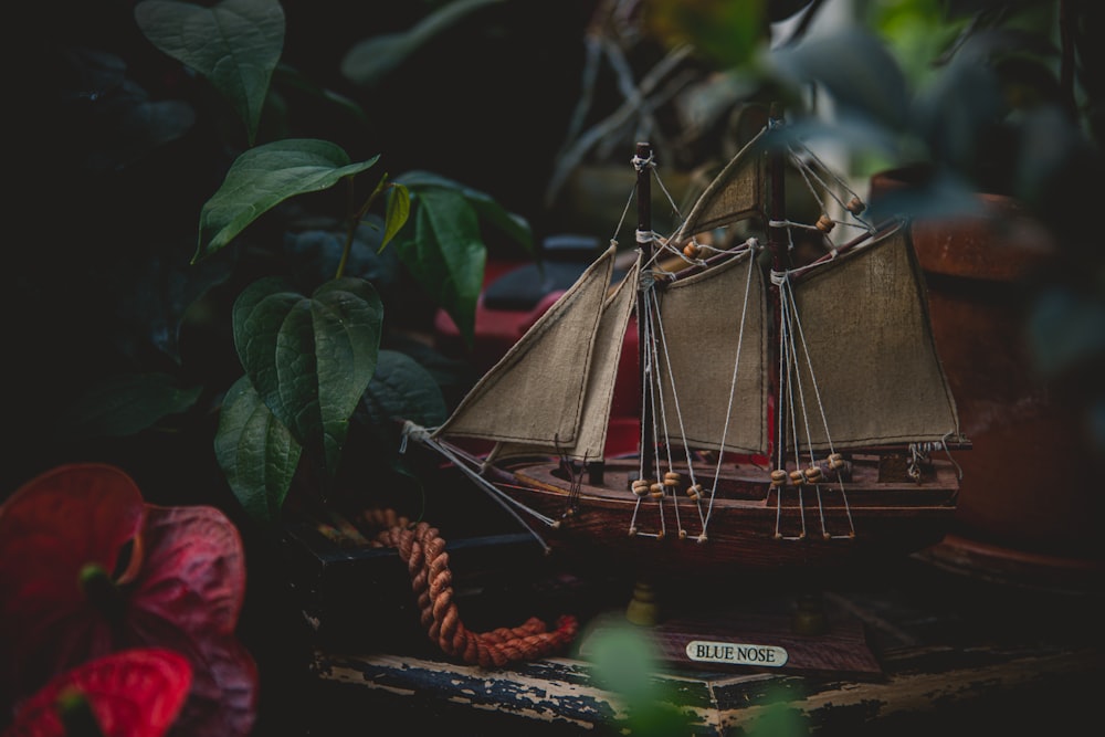 a toy boat is sitting on a table