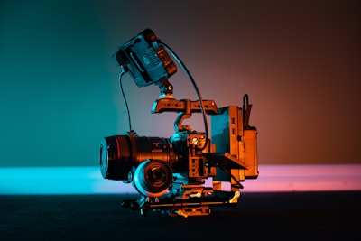 alt="a close up of a camera on a tripod"