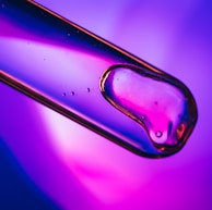 a close up of a purple and blue liquid