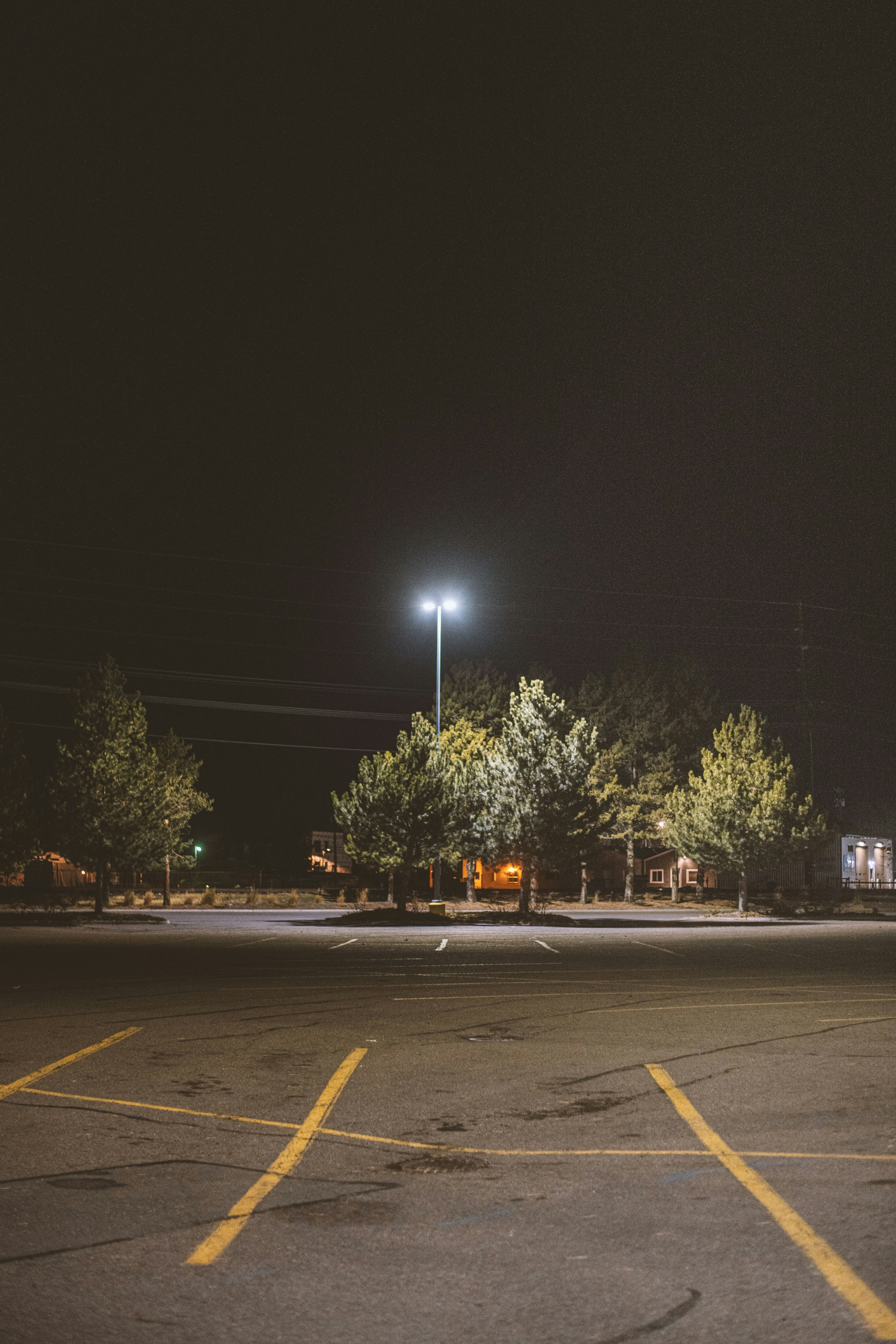 solar-powered security lights protecting a commercial parking area at night