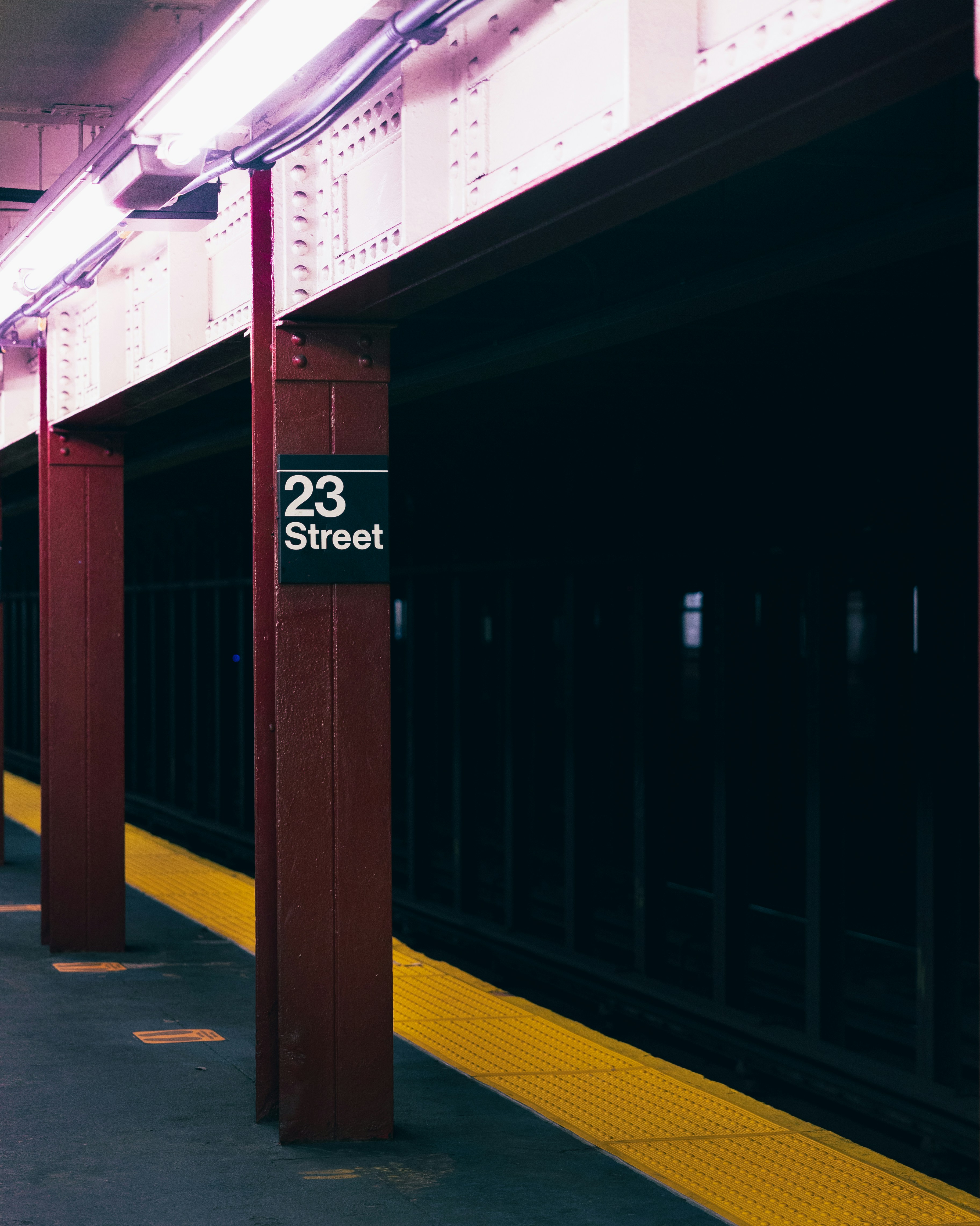 a train station with a sign that reads 23rd street