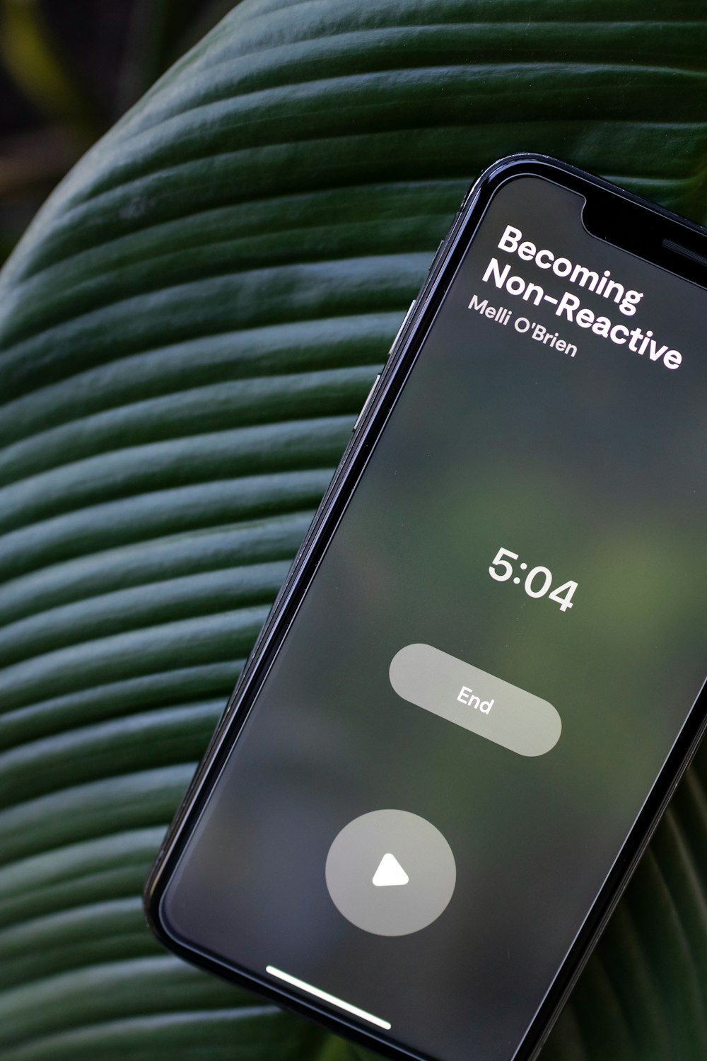 a cell phone with the text becoming non - reactative next to it