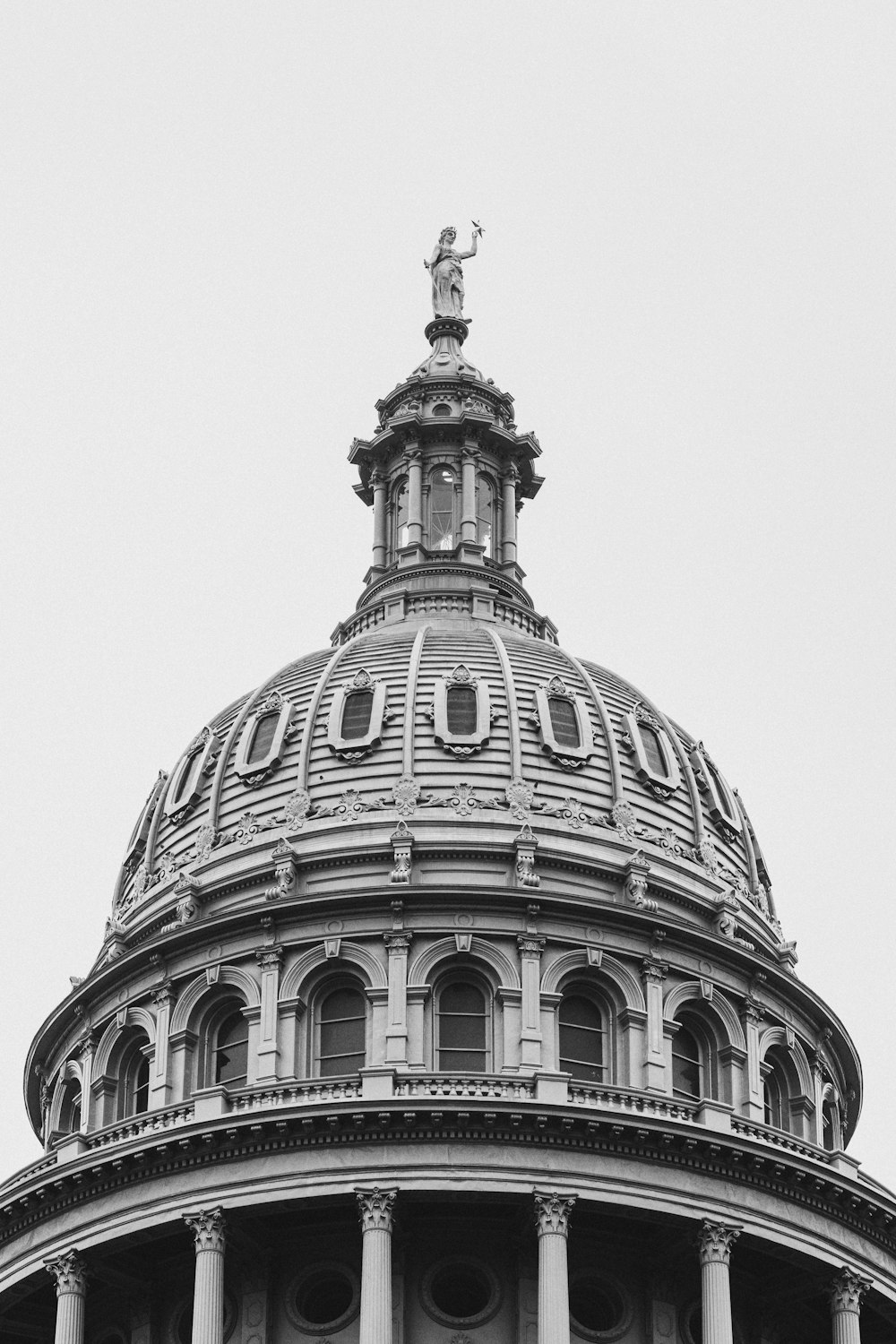 a black and white photo of the dome of a building