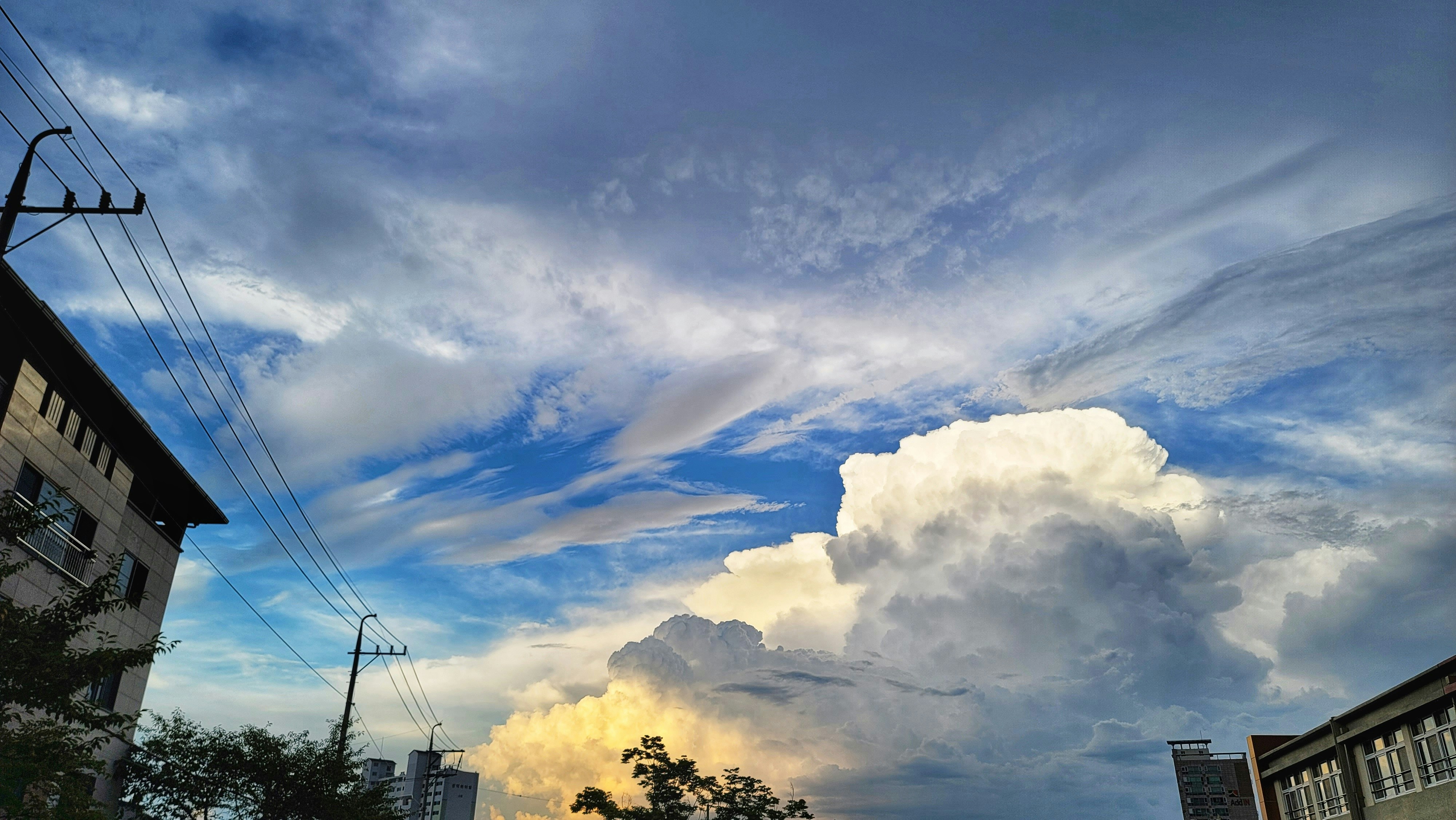 storm clouds over Sugar Land's skyline - commercial roofing Sugar Land
