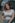 a woman with red hair is posing for a picture