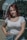 a woman with red hair is posing for a picture