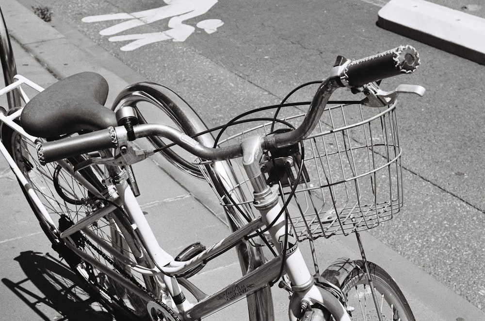 a bicycle parked on the side of the street