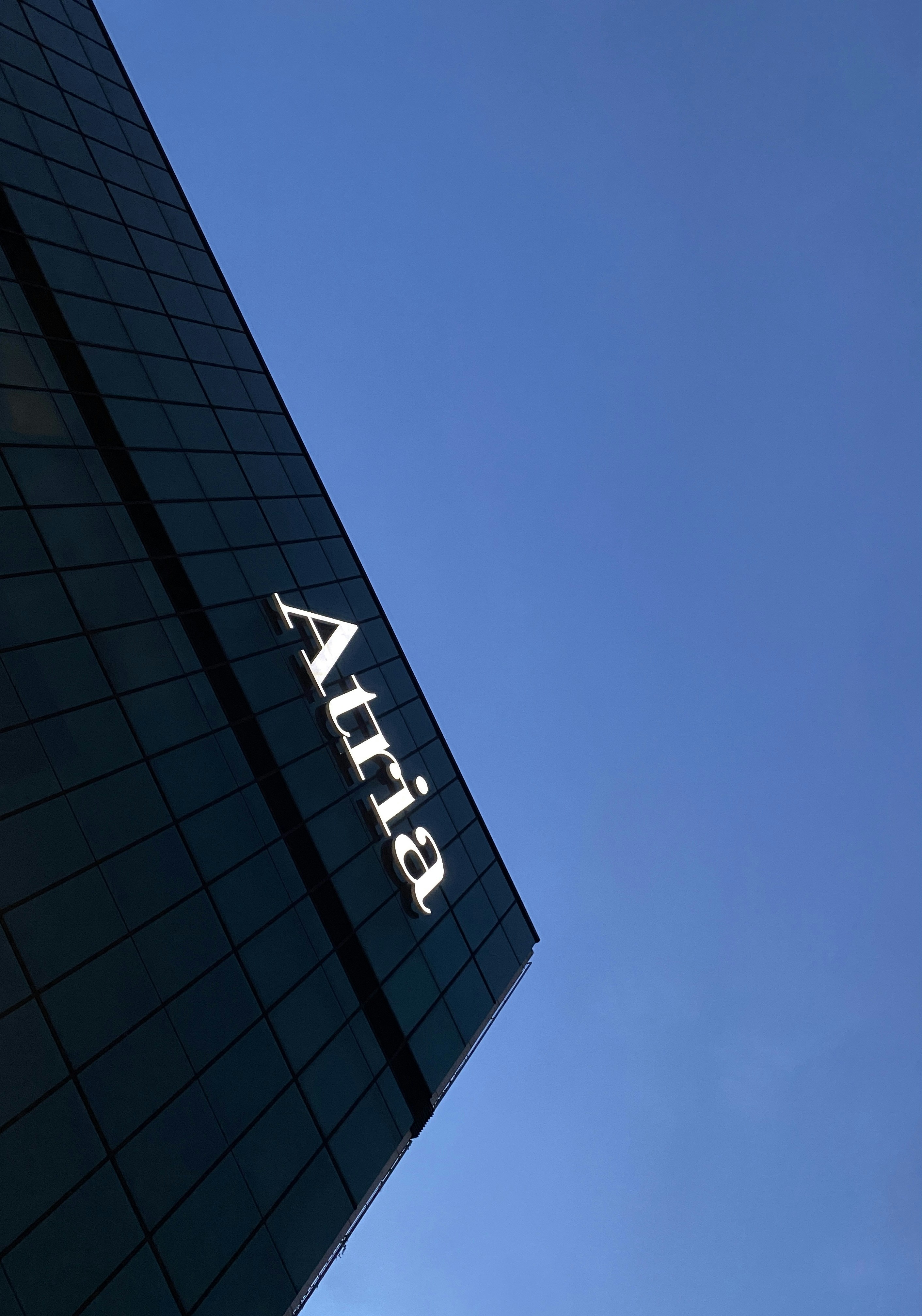 a tall building with the word atlas on it