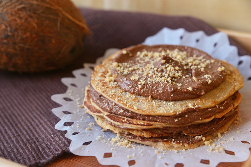 a stack of pancakes sitting on top of a table