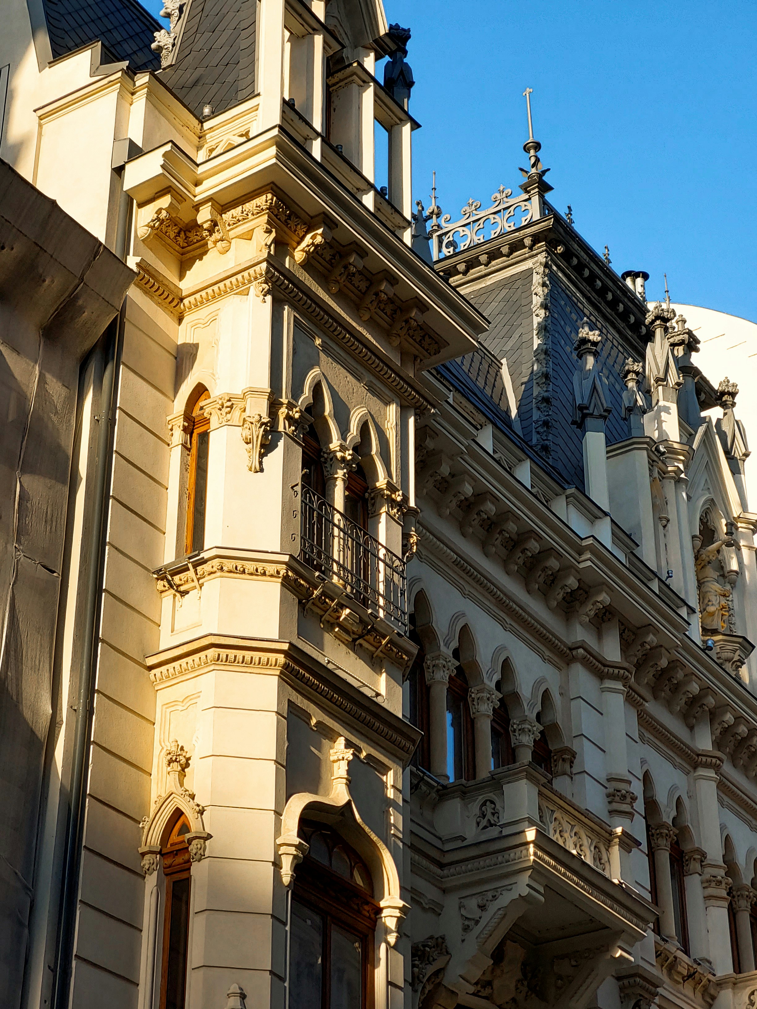 a tall building with a clock on the top of it