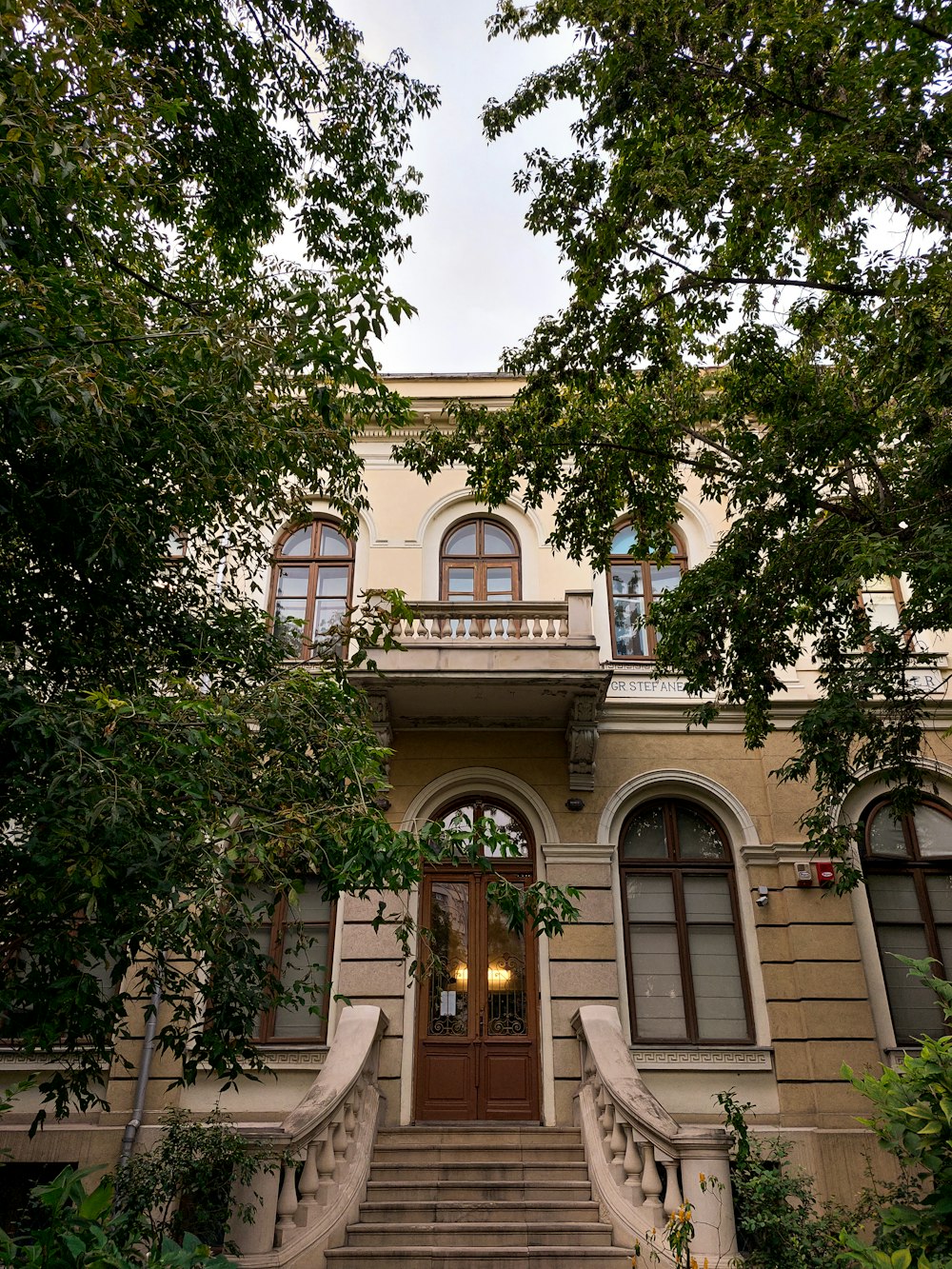 a large building with a staircase leading to it