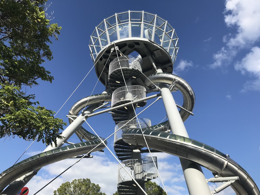 a very tall metal structure with a sky background