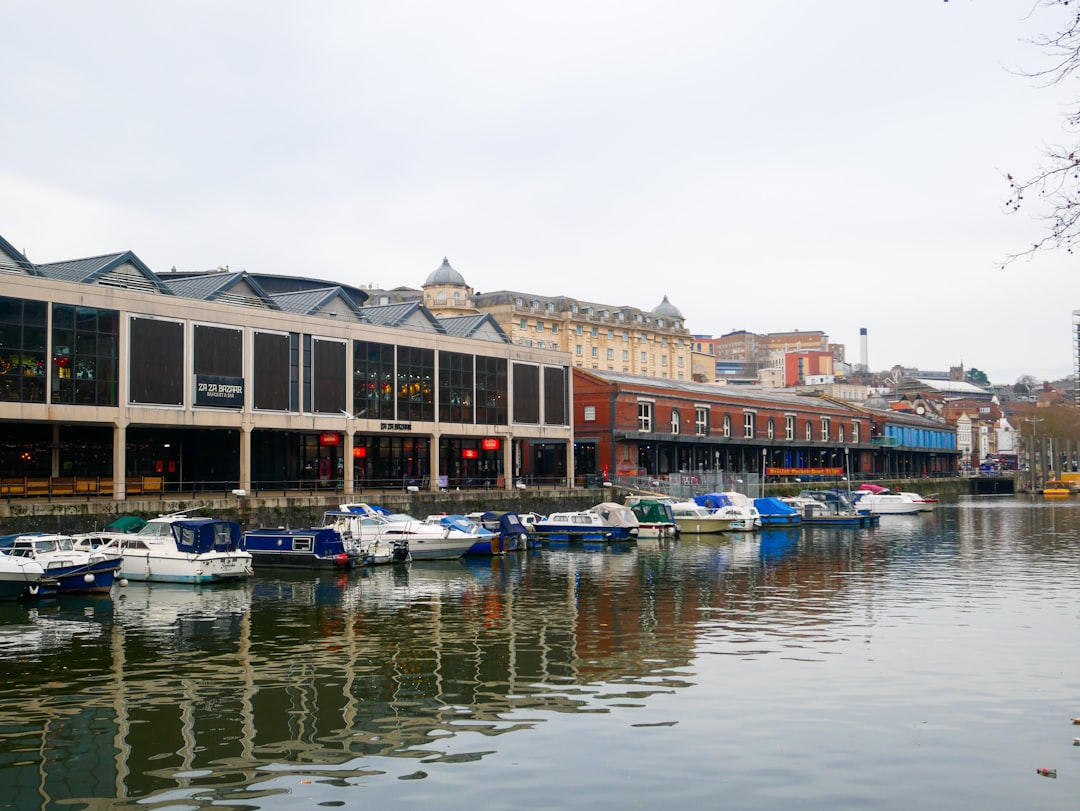 a bunch of boats that are sitting in the water,